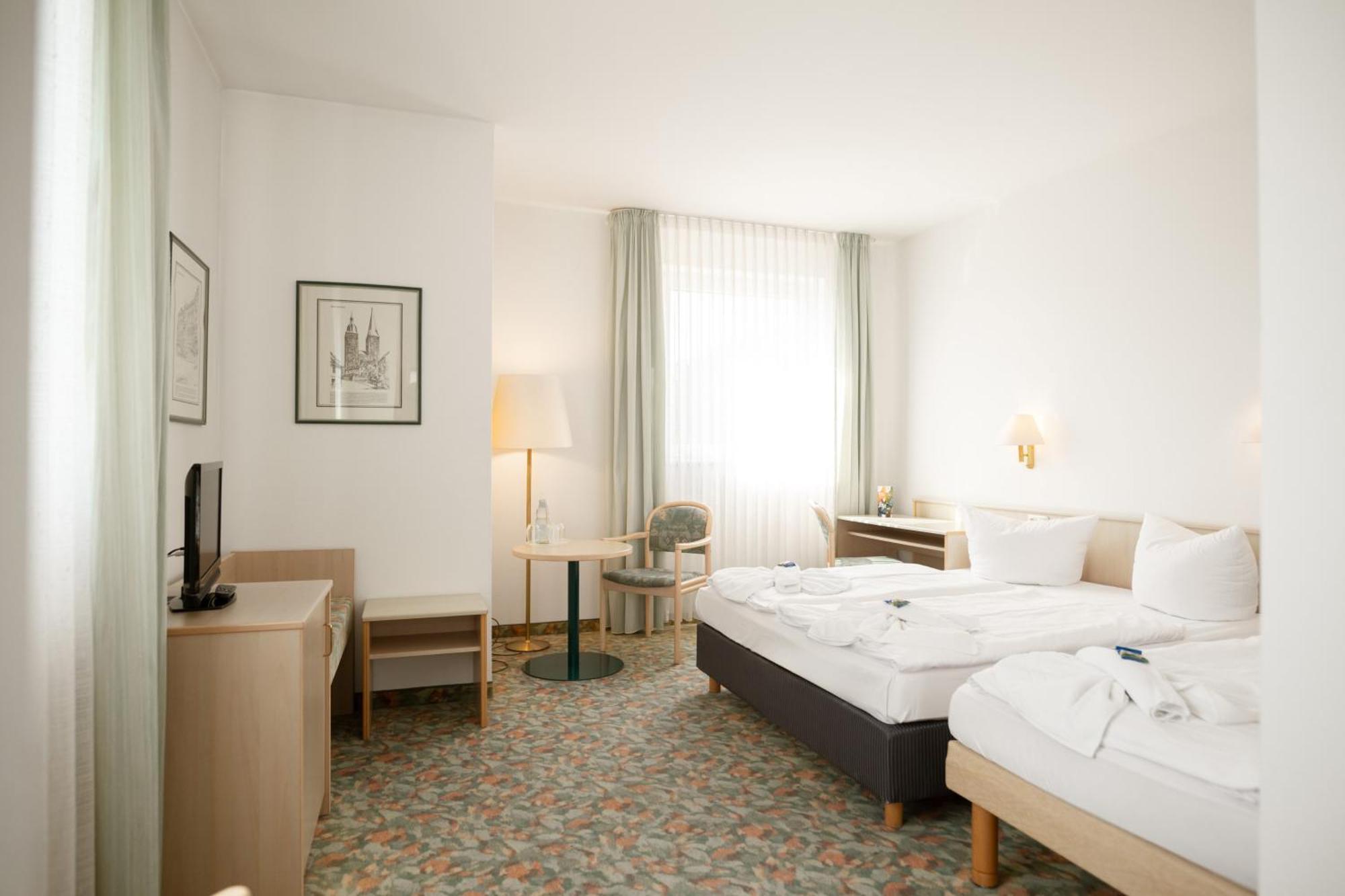 Dreibettzimmer